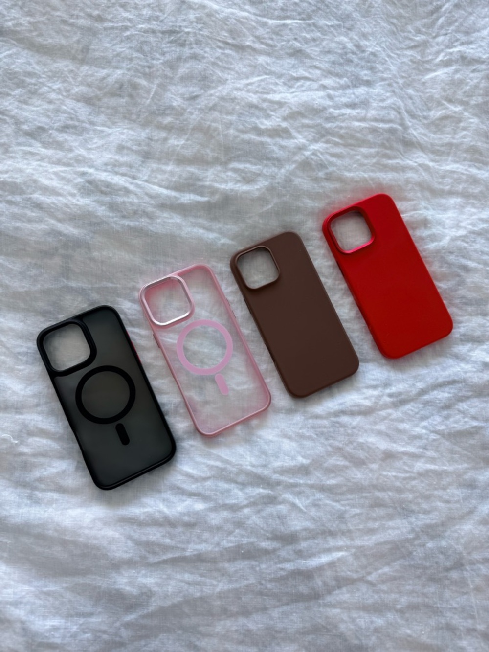 Assorted iPhone 16 Pro Max Cases - Black, Pink, Brown, Red